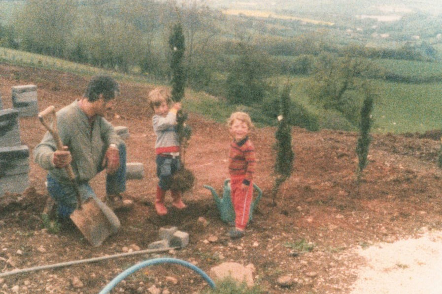 Ray and the kids at work in the gardens